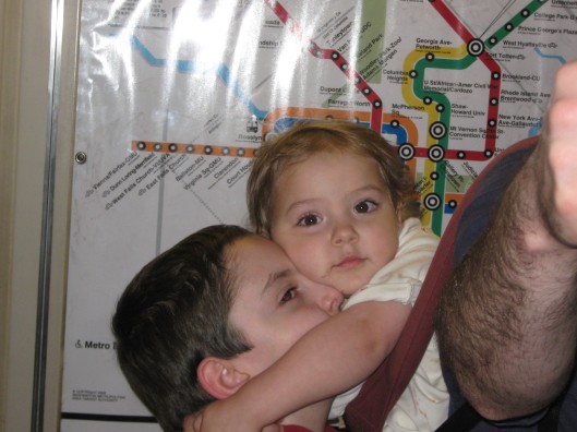 Whingari hugging Nic's head - on the metro ride home